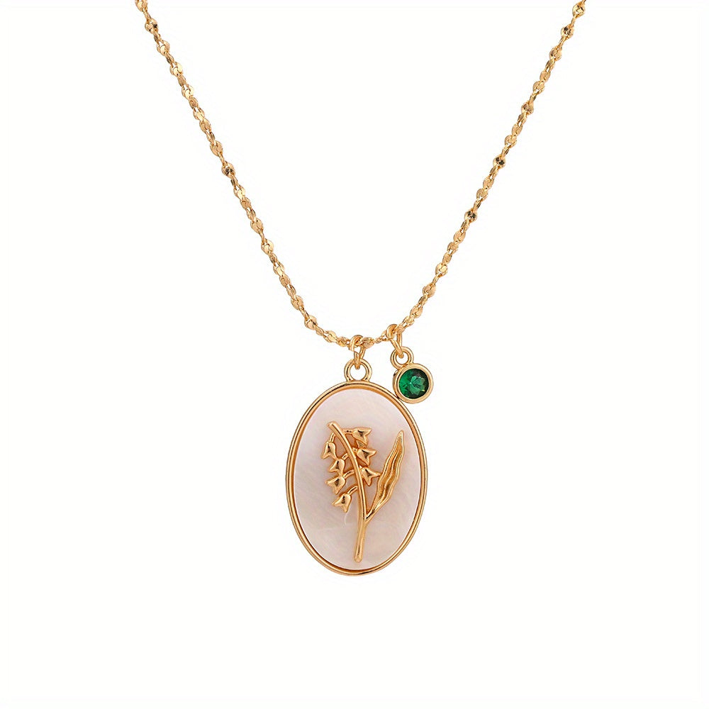 A Three-Dimensional Oval-Shaped Pendant Necklace Made of Golden with a Birthstone And White Mother-Of-Pearl, Featuring a December Flower Design