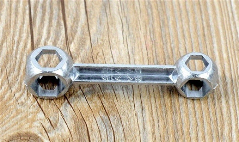 Versatile Bone-Shaped Hex Wrench for Bicycle Repair - Durable Zinc Alloy, Multi-Hole Design, Silvery