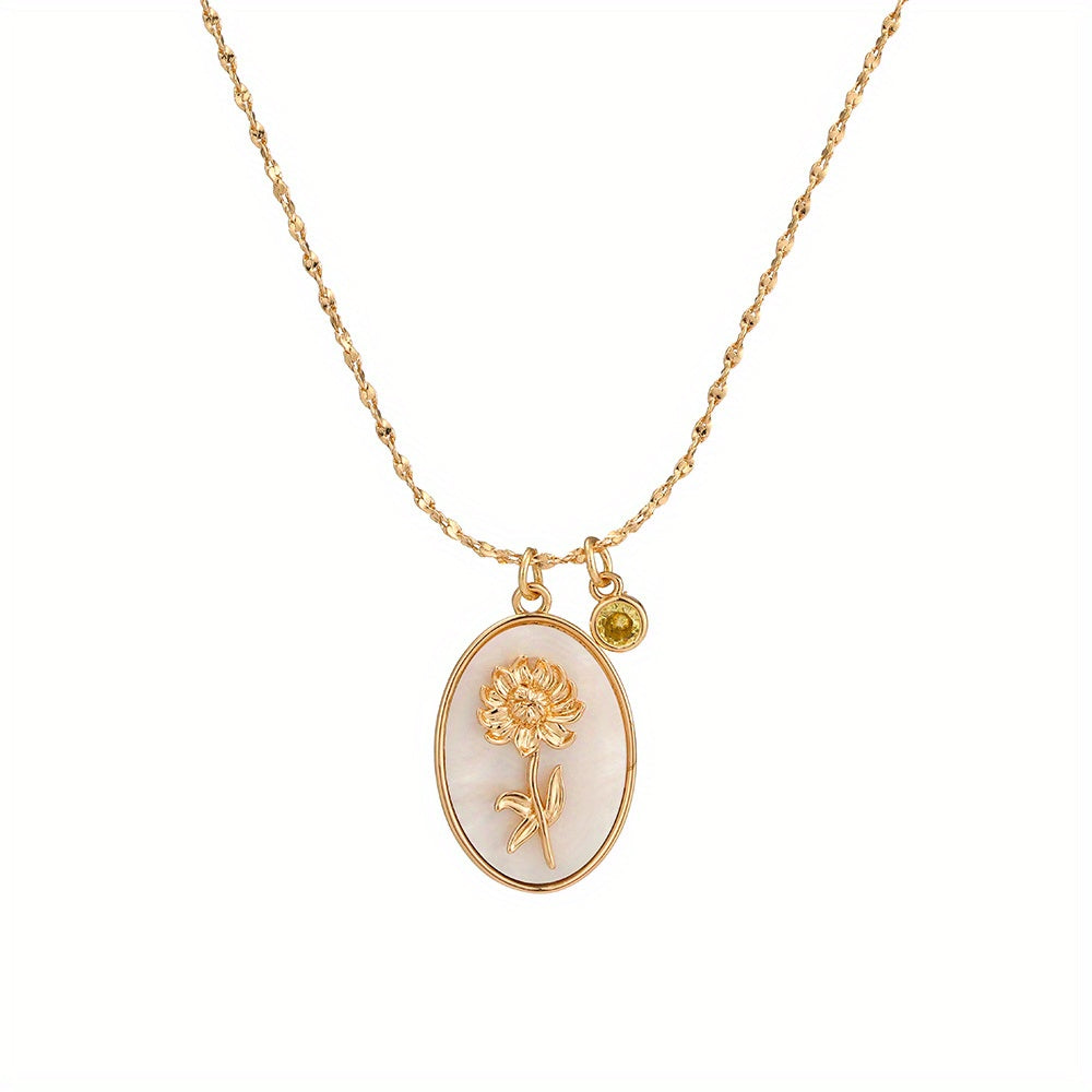 A Three-Dimensional Oval-Shaped Pendant Necklace Made of Golden with a Birthstone And White Mother-Of-Pearl, Featuring a December Flower Design