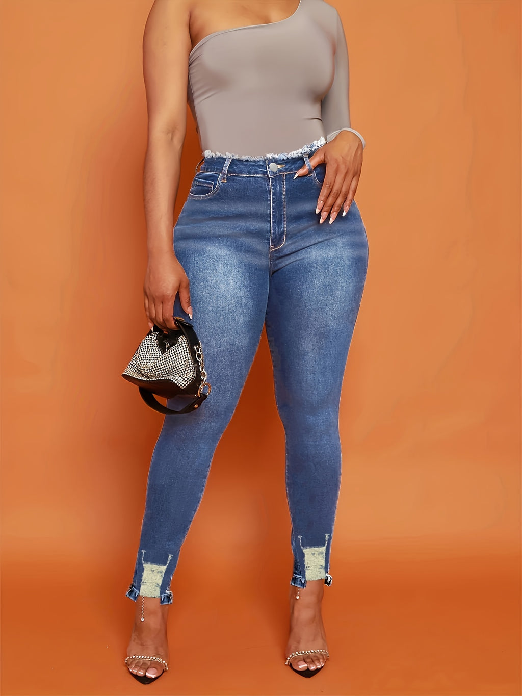 Chic & Stylish Blue Ripped Skinny Jeans for Women - Versatile, High-Stretch, Easy-Care Denim with Raw Hem