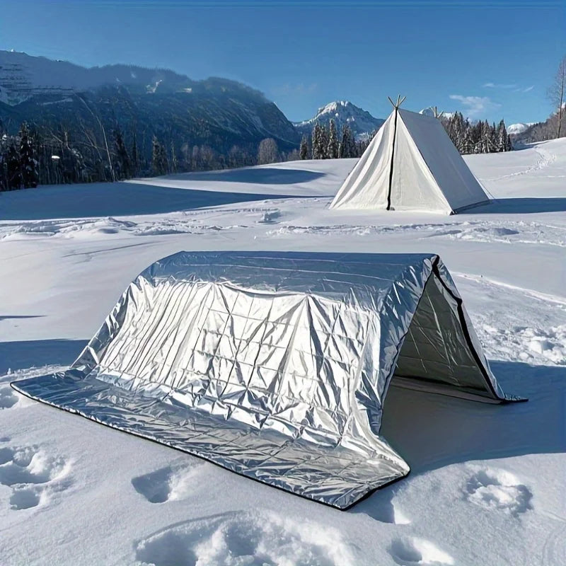 Outdoor emergency silver survival blanket with lightweight aluminum foil insulation suitable for camping hiking, and evacuation