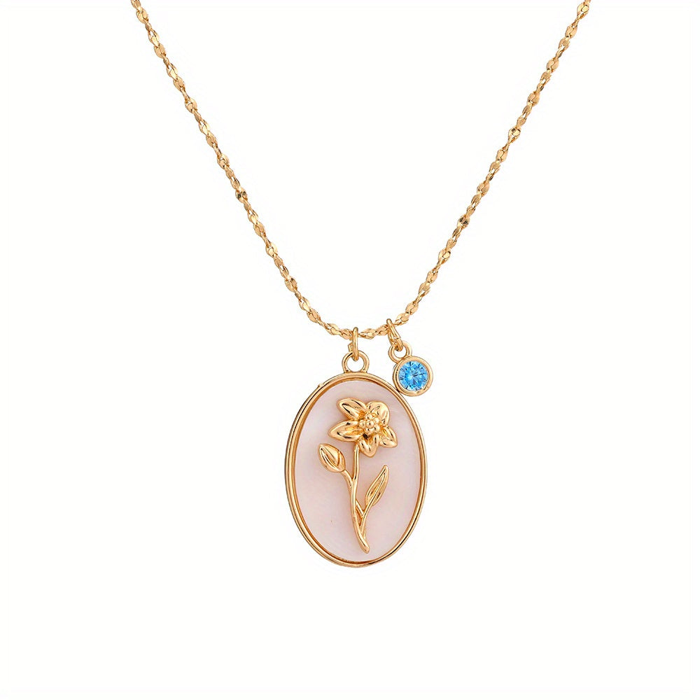 A Three-Dimensional Oval-Shaped Pendant Necklace Made of Golden with a Birthstone And White Mother-Of-Pearl, Featuring a December Flower Design